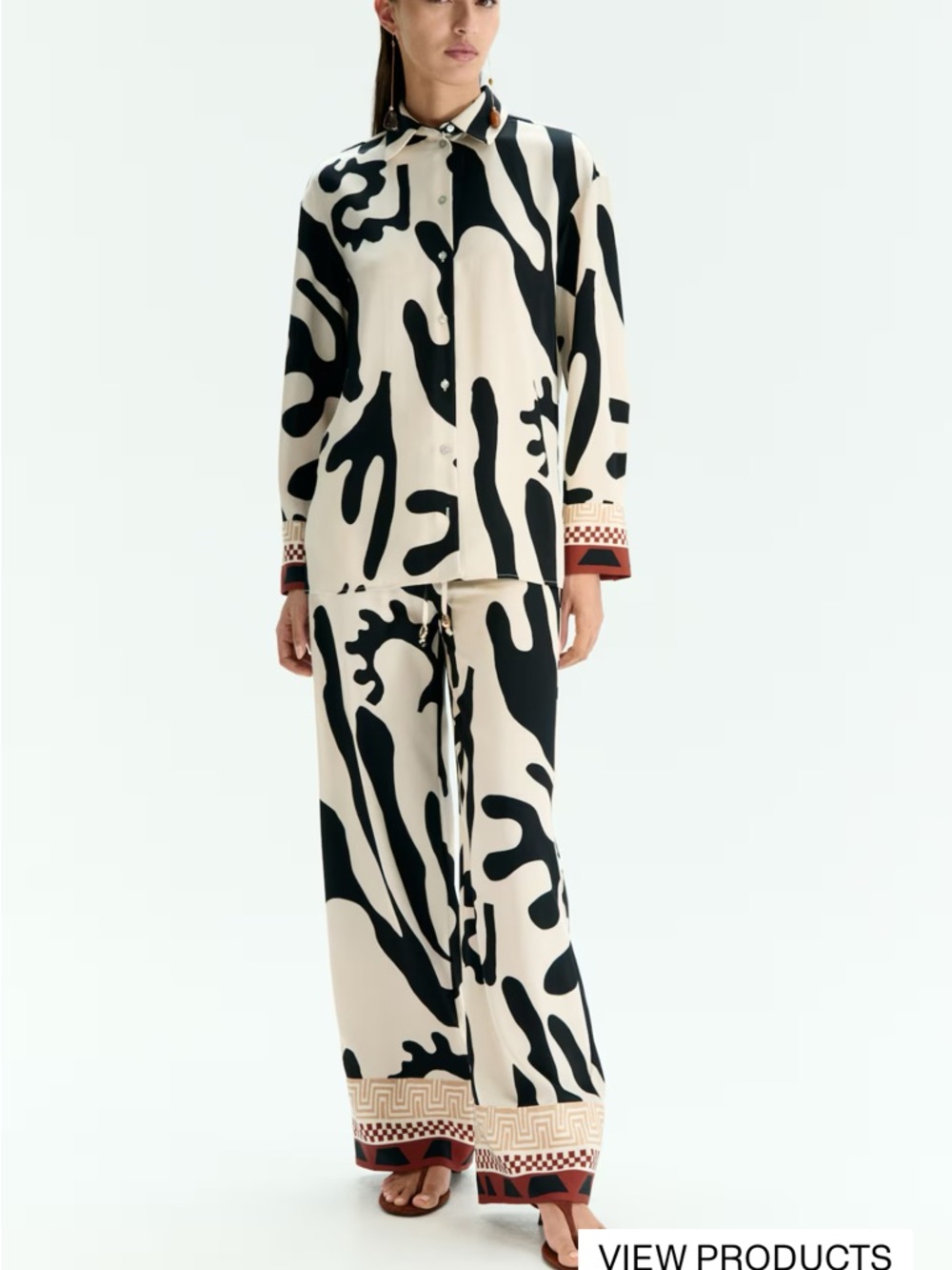 H&M Black and Cream Abstract Print Button-Up Top